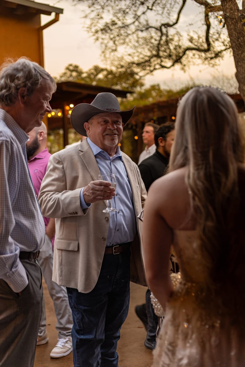 Guests gathered outside at a celebration